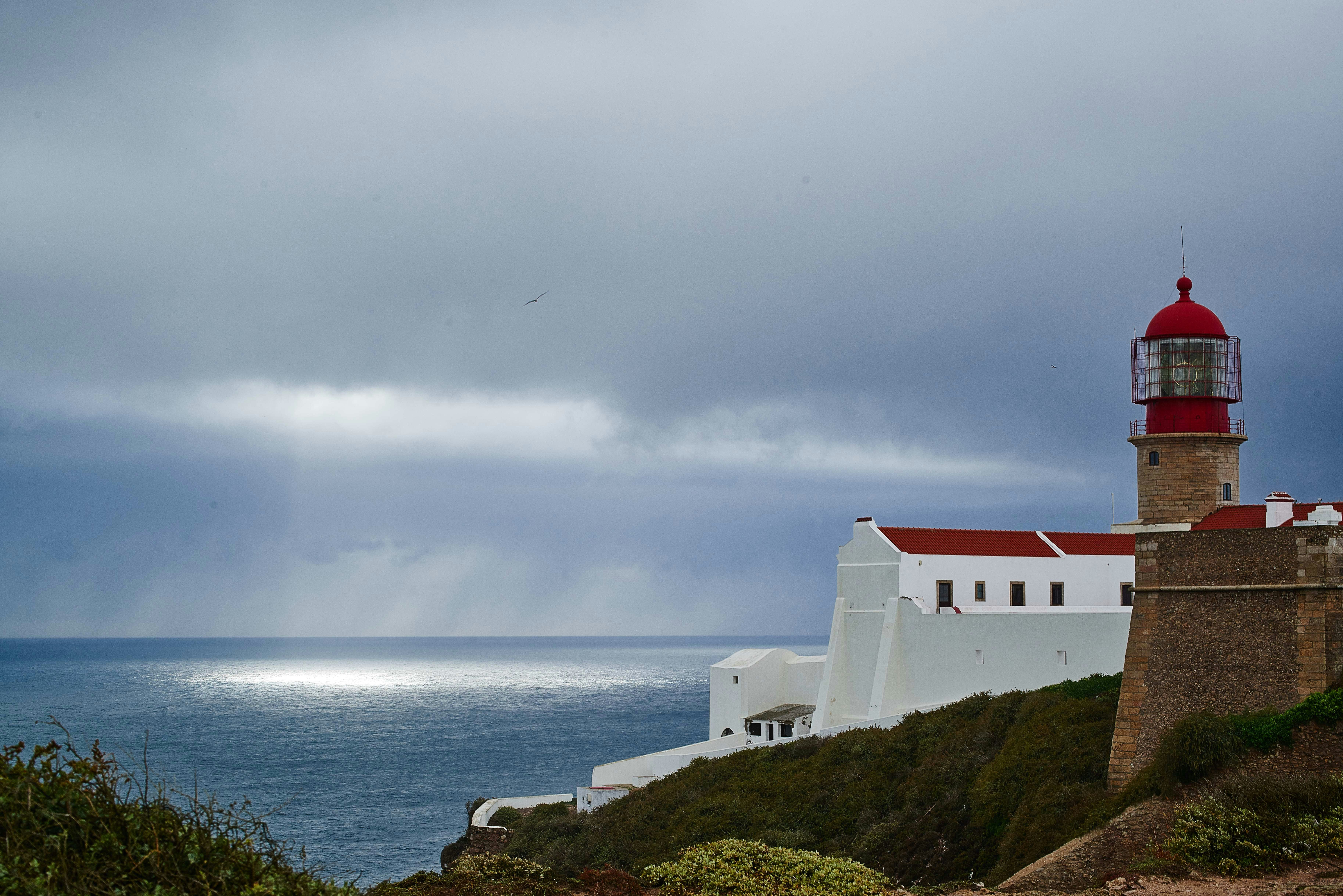 lighthouse near body of water